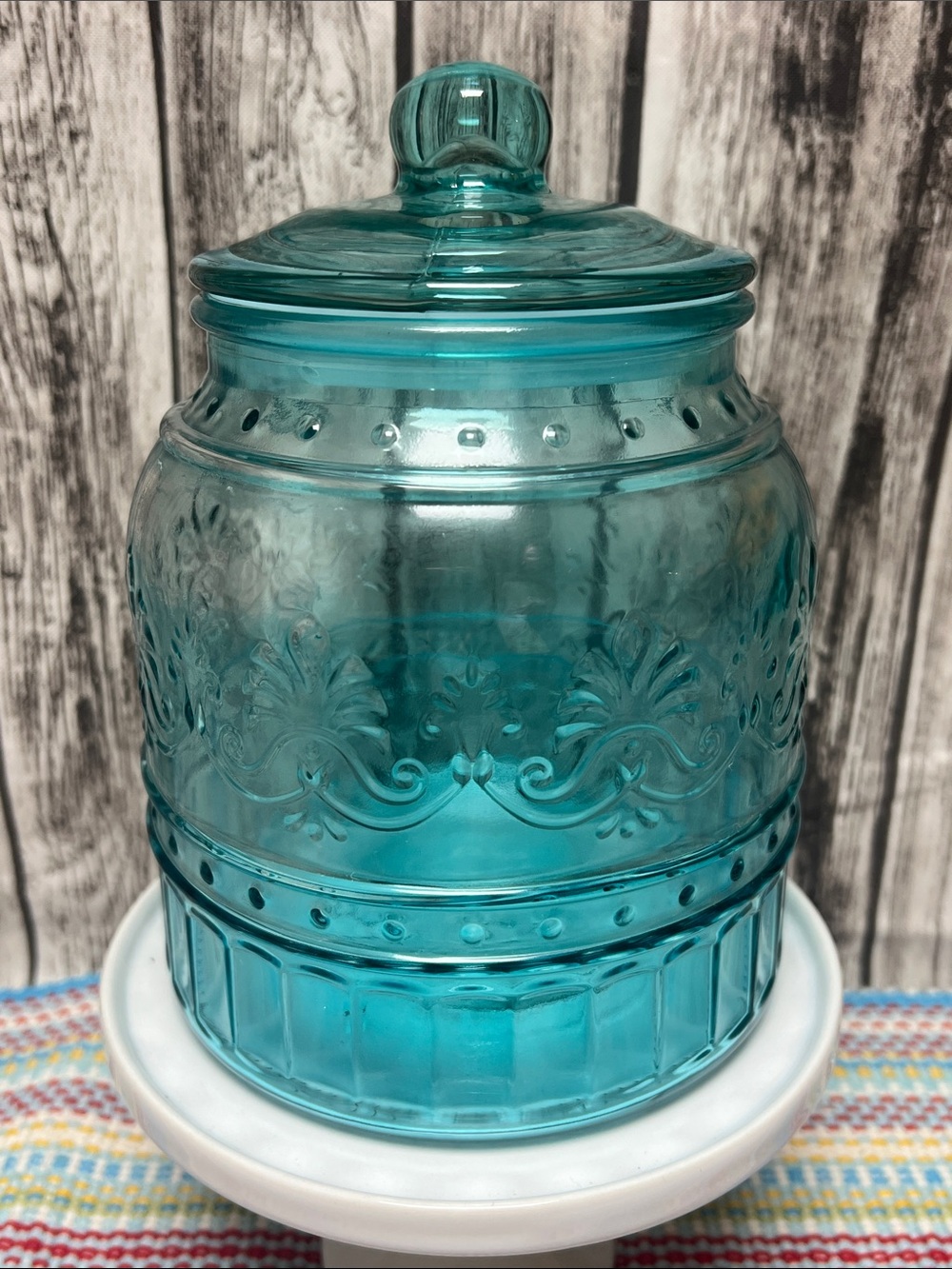 The Pioneer Woman “Cassie” Teal Embossed glass canister-Medium- 53.5 oz- 5.5”X7”